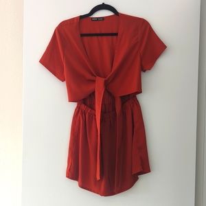 Orange romper - never worn